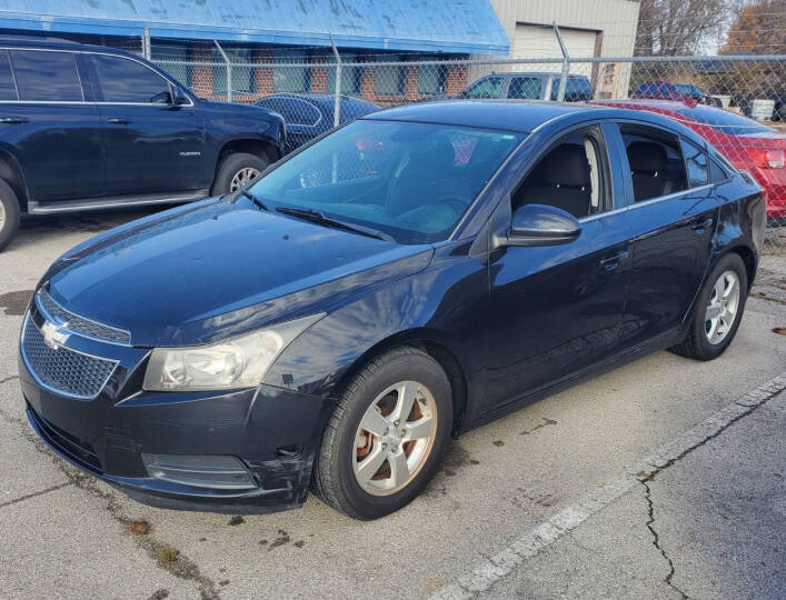 2014 Chevrolet Cruze for sale at DURANGO AUTO CENTER LLC in Tulsa, OK