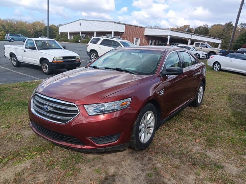 2014 Ford Taurus for sale at Ray Moore Auto Sales in Graham NC