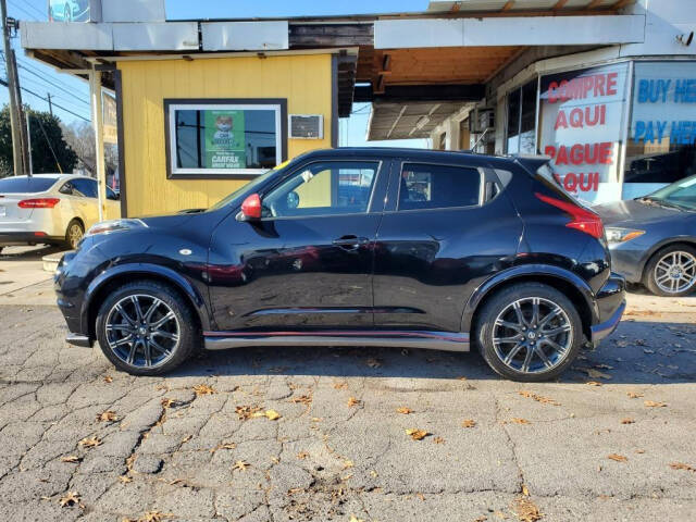 2013 Nissan JUKE for sale at DAGO'S AUTO SALES LLC in Dalton, GA