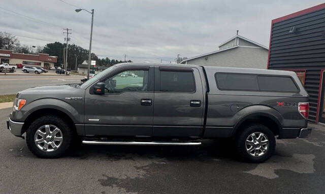 2014 Ford F-150 for sale at SIGNATURE AUTOS LLC in Weston, WI