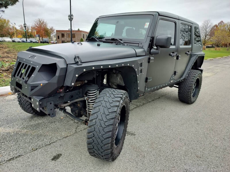 2015 Jeep Wrangler Unlimited for sale at Raptor Motors in Chicago IL