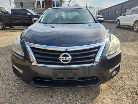 2015 Nissan Altima for sale at TIM'S AUTO SOURCING LIMITED in Tallmadge OH