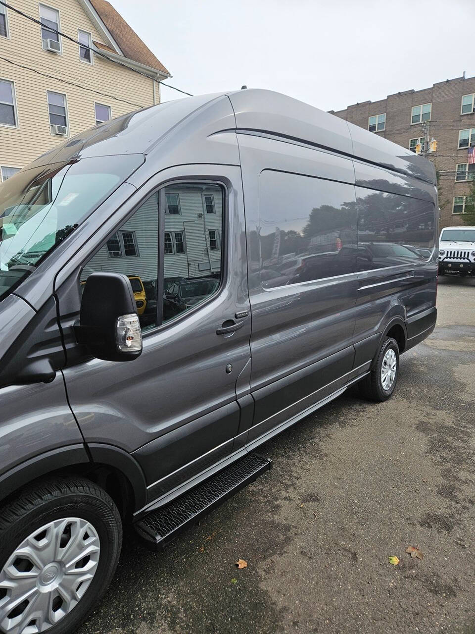 2023 Ford E-Transit for sale at RENOS AUTO SALES LLC in Waterbury, CT