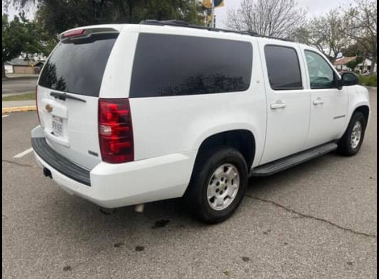 2012 Chevrolet Suburban for sale at AUTO 4 LESS in Fresno, CA