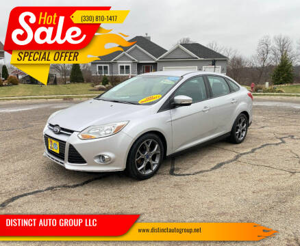 2014 Ford Focus for sale at DISTINCT AUTO GROUP LLC in Kent OH