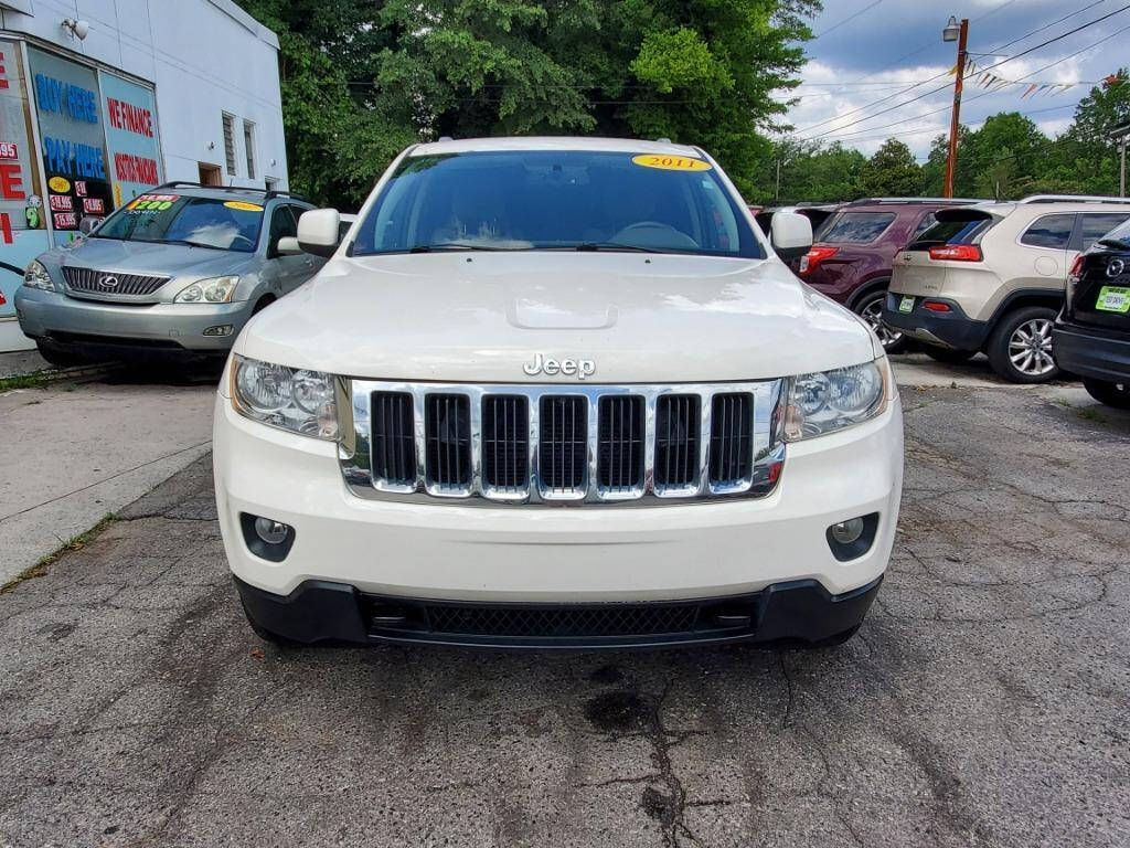 2011 Jeep Grand Cherokee for sale at DAGO'S AUTO SALES LLC in Dalton, GA