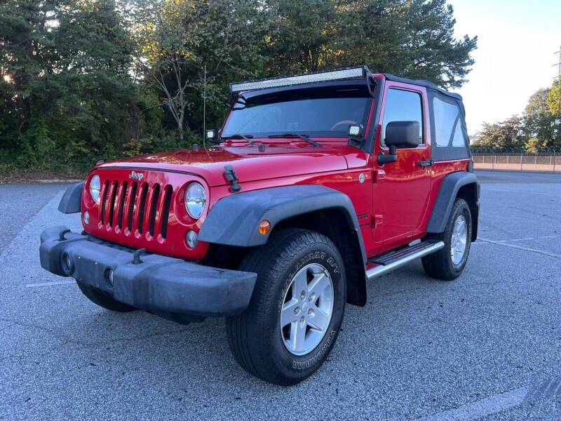 2014 Jeep Wrangler for sale at Triple A's Motors in Greensboro NC