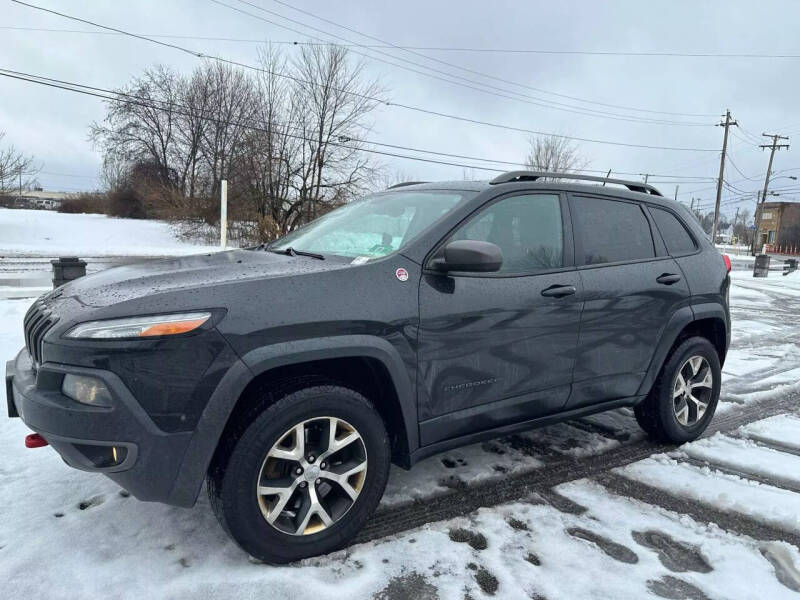 2015 Jeep Cherokee for sale at Glizzy Auto Sales in Barberton OH