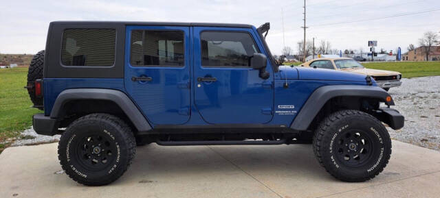 2010 Jeep Wrangler Unlimited for sale at CORNMAN AUTO LLC in Kirksville, MO