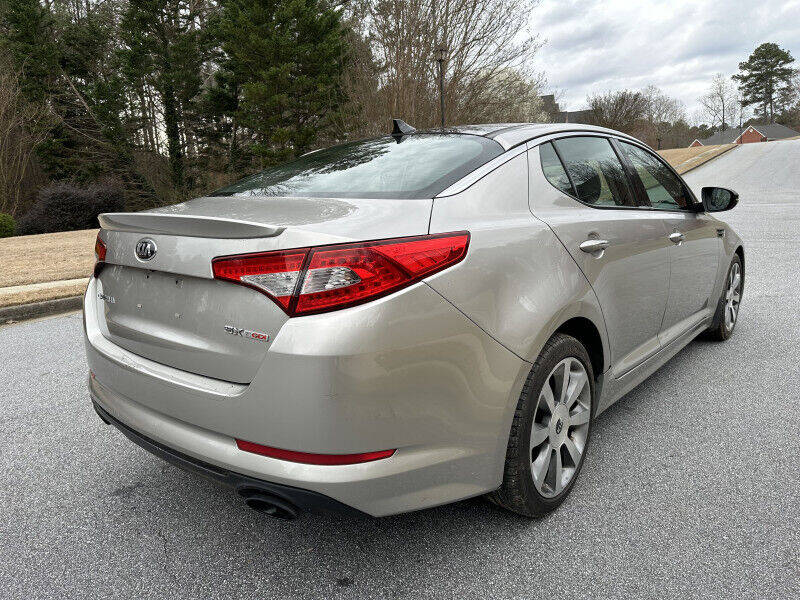 2013 Kia Optima for sale at SHURE AUTO SALES in Snellville, GA