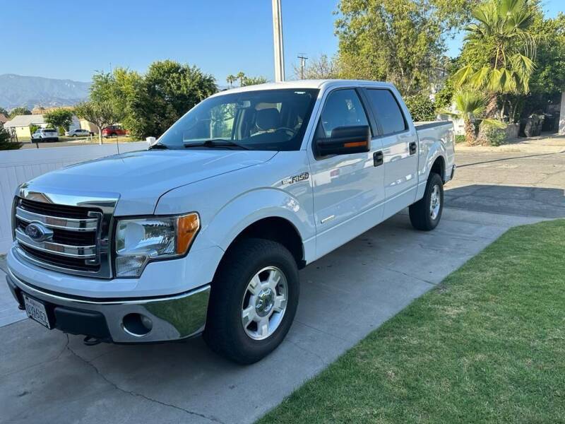 2013 Ford F-150 for sale at E and M Auto Sales in Bloomington CA