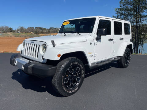 2014 Jeep Wrangler Unlimited for sale at BILL HANCOCK MOTORS LLC in Albertville AL