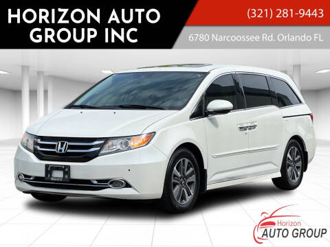 2014 Honda Odyssey for sale at HORIZON AUTO GROUP INC in Orlando FL