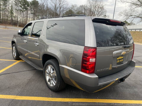 2009 Chevrolet Suburban for sale at Palmer Automobile Sales in Decatur GA