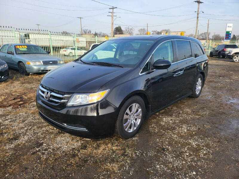 2014 Honda Odyssey for sale at DEALER CONNECTED INC in Detroit MI