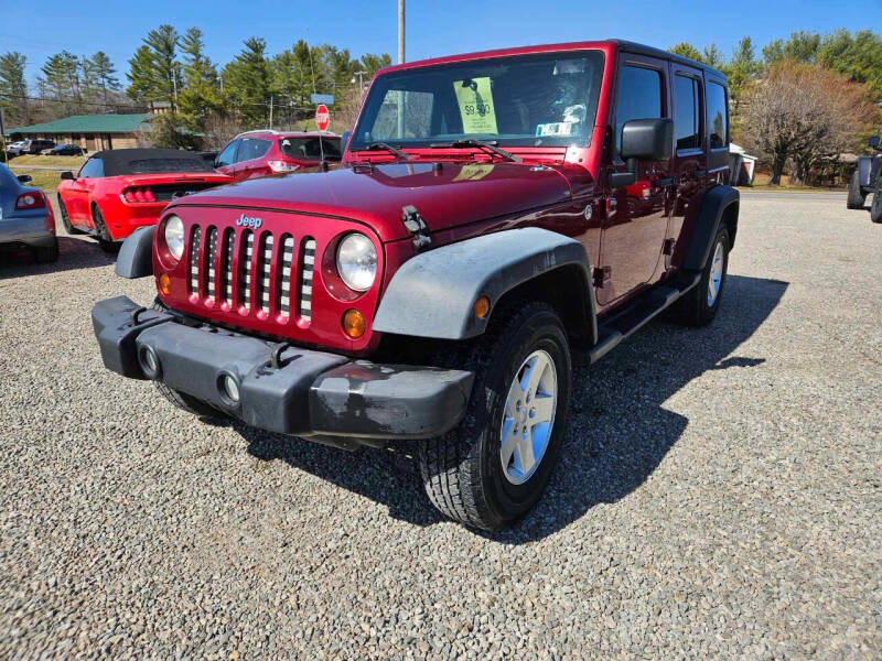 2012 Jeep Wrangler Unlimited for sale at Daves Supreme Auto Sales LLC in Gallipolis OH