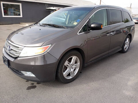 2012 Honda Odyssey for sale at COMMUNITY AUTO in Fresno CA