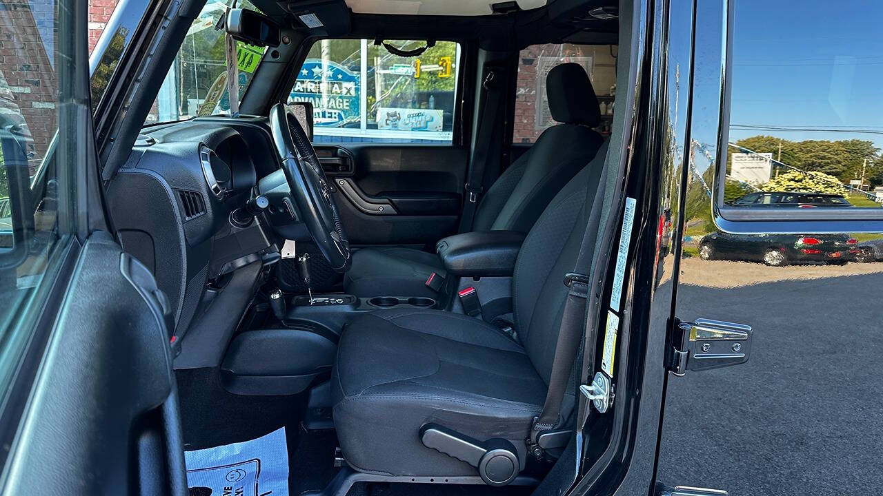 2018 Jeep Wrangler JK Unlimited for sale at North Ridge Auto Center LLC in Madison, OH