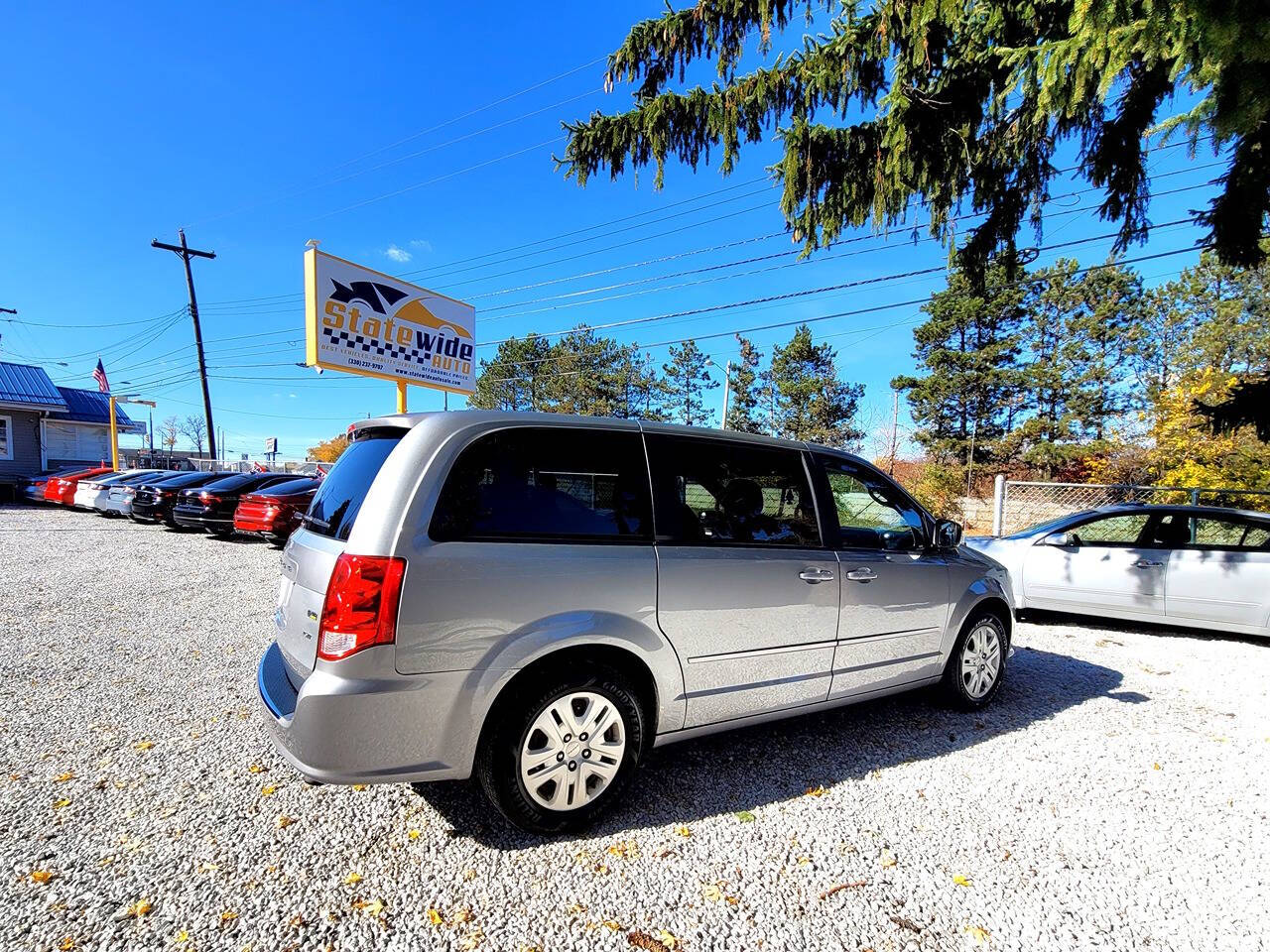 2014 Dodge Grand Caravan for sale at Statewide Auto LLC in Akron, OH