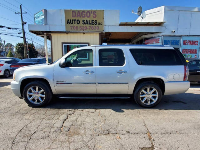 2011 GMC Yukon XL for sale at DAGO'S AUTO SALES LLC in Dalton, GA