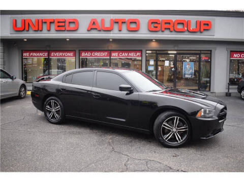 2014 Dodge Charger for sale at United Auto Group in Putnam CT