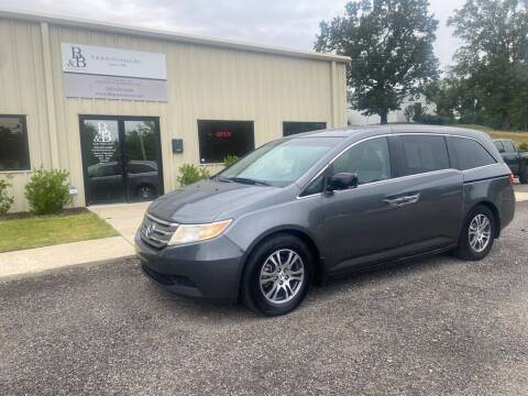 2012 Honda Odyssey for sale at B & B AUTO SALES INC in Odenville AL