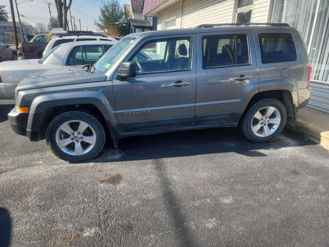 2011 Jeep Patriot for sale at Maximum Auto Group II INC in Cortland OH