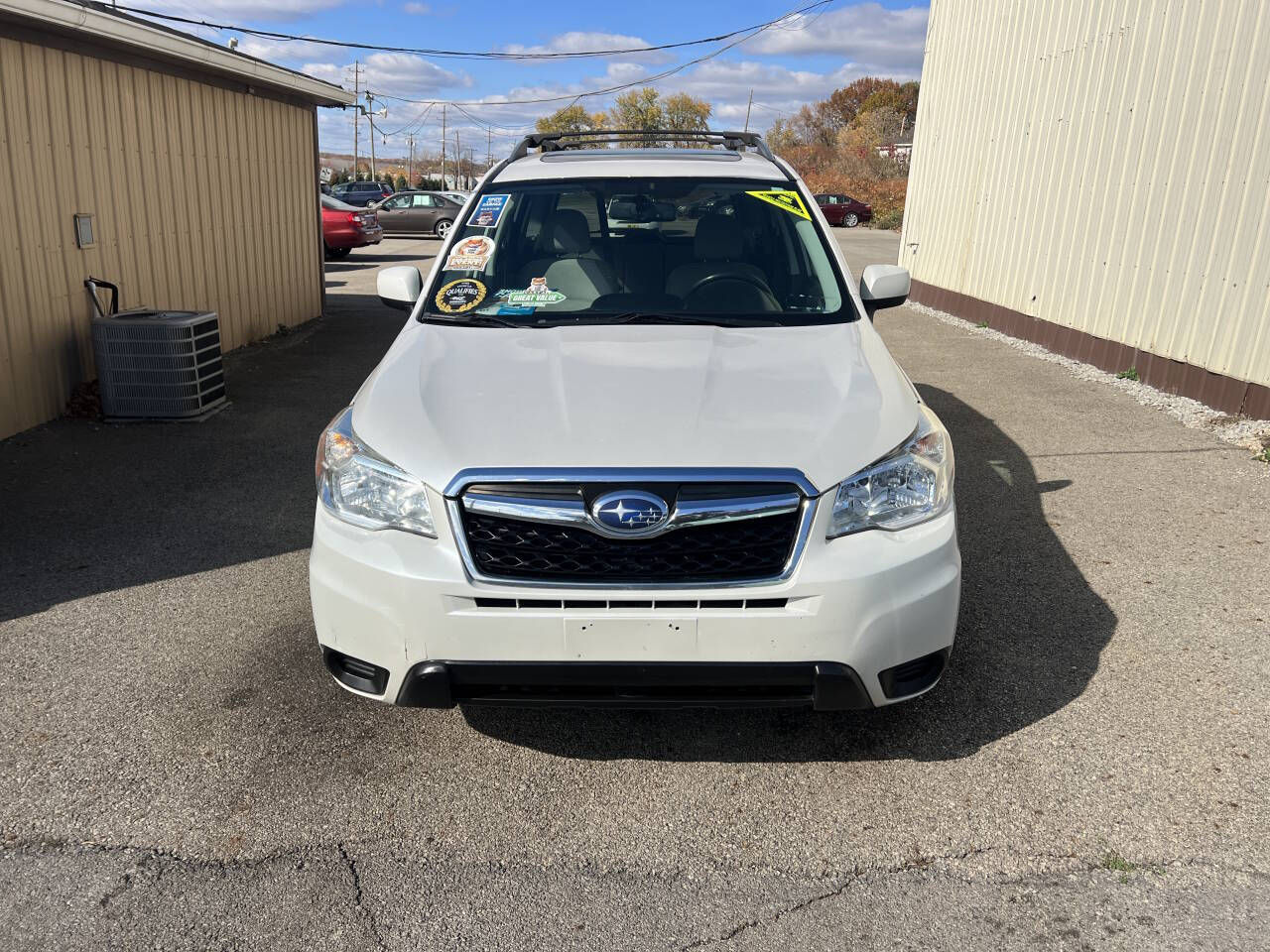 2014 Subaru Forester for sale at BNM AUTO GROUP in GIRARD, OH