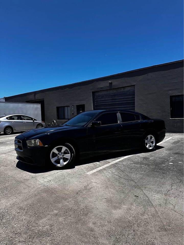 2012 Dodge Charger for sale at ALPHA AUTOMOTIVE SALES in Oakland Park, FL