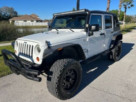2012 Jeep Wrangler Unlimited for sale at CLEAR SKY AUTO GROUP LLC in Land O Lakes FL