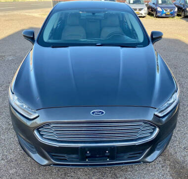 2015 Ford Fusion for sale at Good Auto Company LLC in Lubbock TX