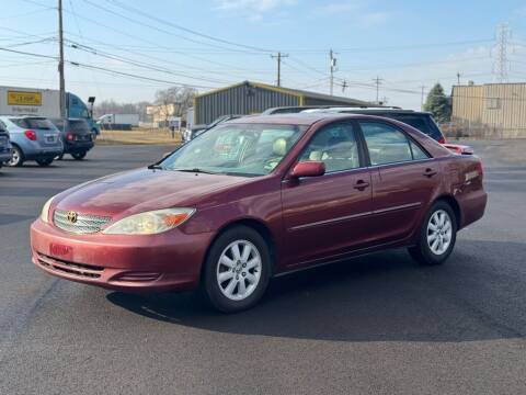 2002 Toyota Camry for sale at Queen City Auto House LLC in West Chester OH