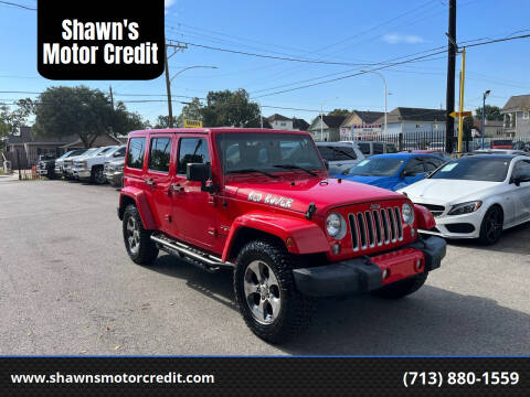2016 Jeep Wrangler Unlimited for sale at Shawn's Motor Credit in Houston TX