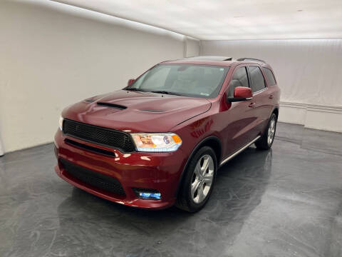 2014 Dodge Durango for sale at Roman's Auto Sales in Warren MI