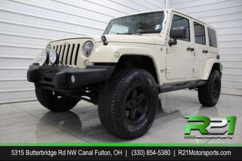 2011 Jeep Wrangler Unlimited for sale at Route 21 Auto Sales in Canal Fulton OH