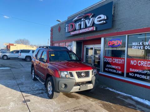 2013 Nissan Xterra for sale at iDrive Auto Group in Eastpointe MI