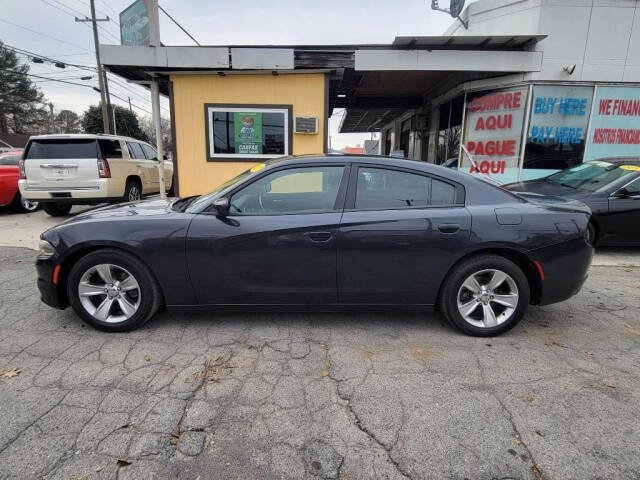 2017 Dodge Charger for sale at DAGO'S AUTO SALES LLC in Dalton, GA