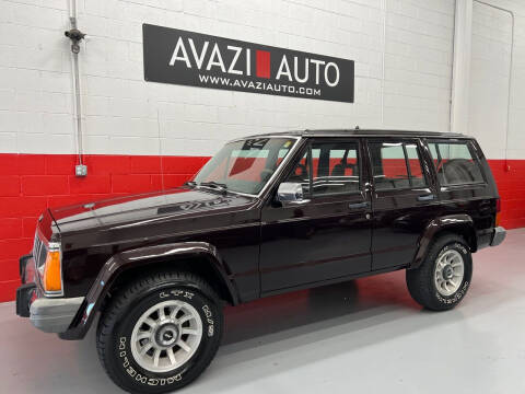 1990 Jeep Cherokee for sale at AVAZI AUTO GROUP LLC in Gaithersburg MD