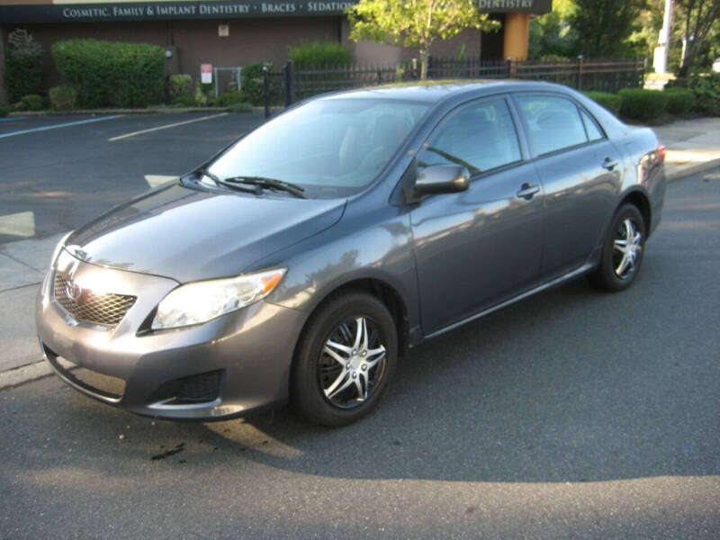2010 Toyota Corolla for sale at Top Choice Auto Inc in Massapequa Park NY