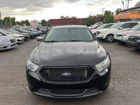 2016 Ford Taurus for sale at SANAA AUTO SALES LLC in Englewood CO