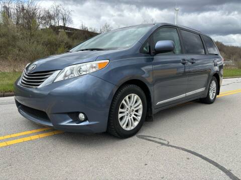 2014 Toyota Sienna for sale at Jim's Hometown Auto Sales LLC in Cambridge OH