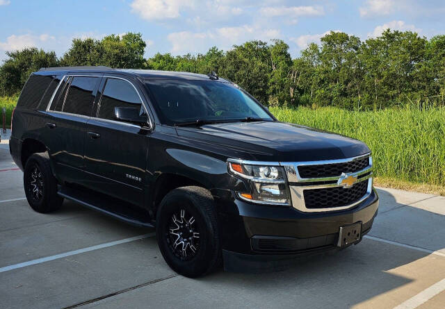 2018 Chevrolet Tahoe for sale at CAR MARKET AUTO GROUP in Sugar Land, TX