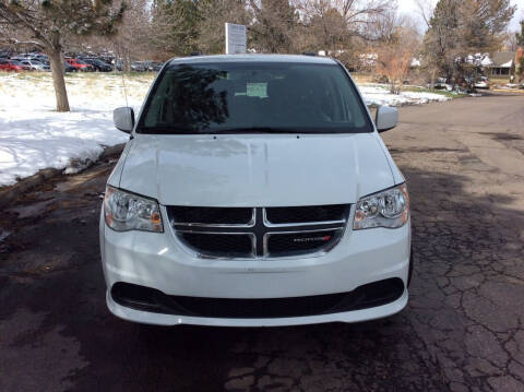 2014 Dodge Grand Caravan for sale at AROUND THE WORLD AUTO SALES in Denver CO
