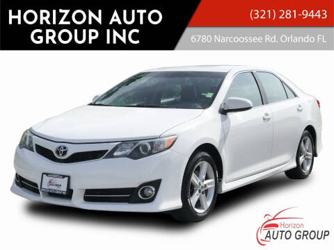 2013 Toyota Camry for sale at HORIZON AUTO GROUP INC in Orlando FL