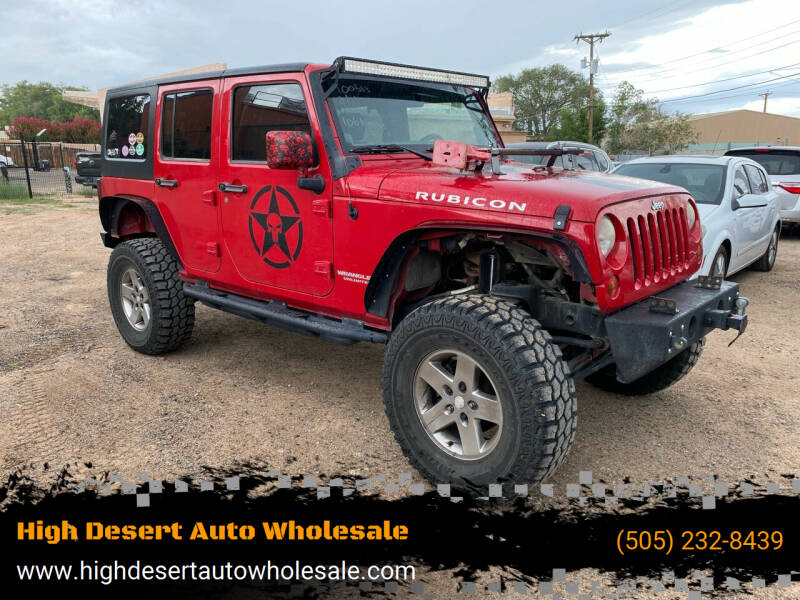 2011 Jeep Wrangler Unlimited for sale at High Desert Auto Wholesale in Albuquerque NM