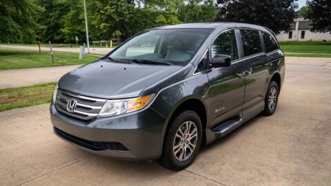 2012 Honda Odyssey for sale at Grand Financial Inc in Solon OH