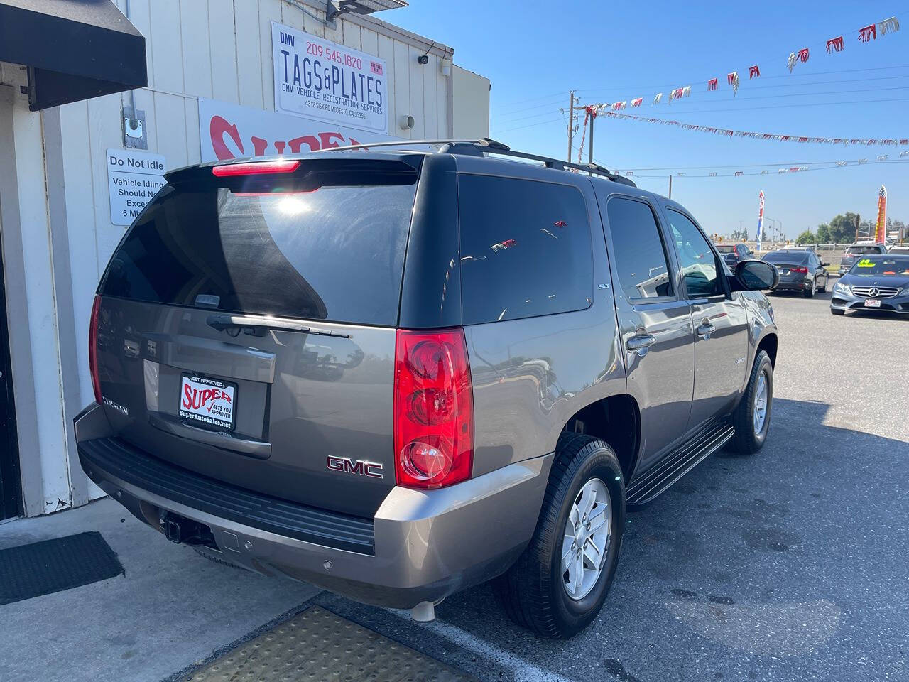 2014 GMC Yukon for sale at Super Auto Sales Modesto in Modesto, CA