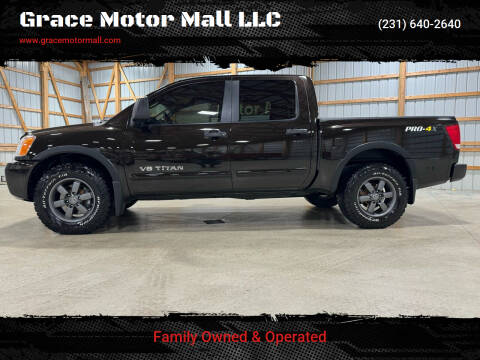 2014 Nissan Titan for sale at Grace Motor Mall LLC in Traverse City MI