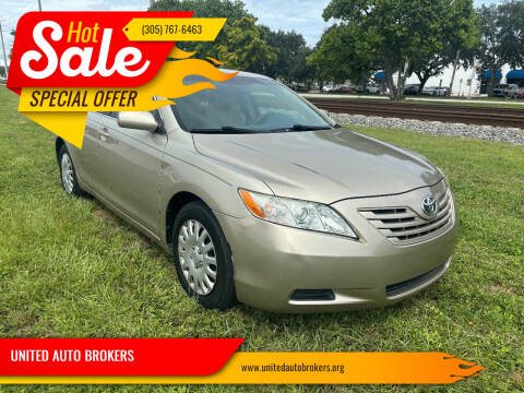 2009 Toyota Camry for sale at UNITED AUTO BROKERS in Hollywood FL