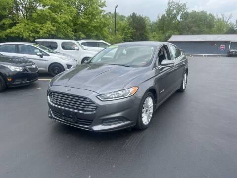 2013 Ford Fusion Hybrid for sale at Newcombs Auto Sales in Auburn Hills MI